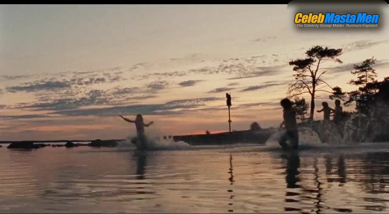 Bill Skarsgard Shirtless, Swimsuit Scene From Behind Blue - Photo 1 of 5
