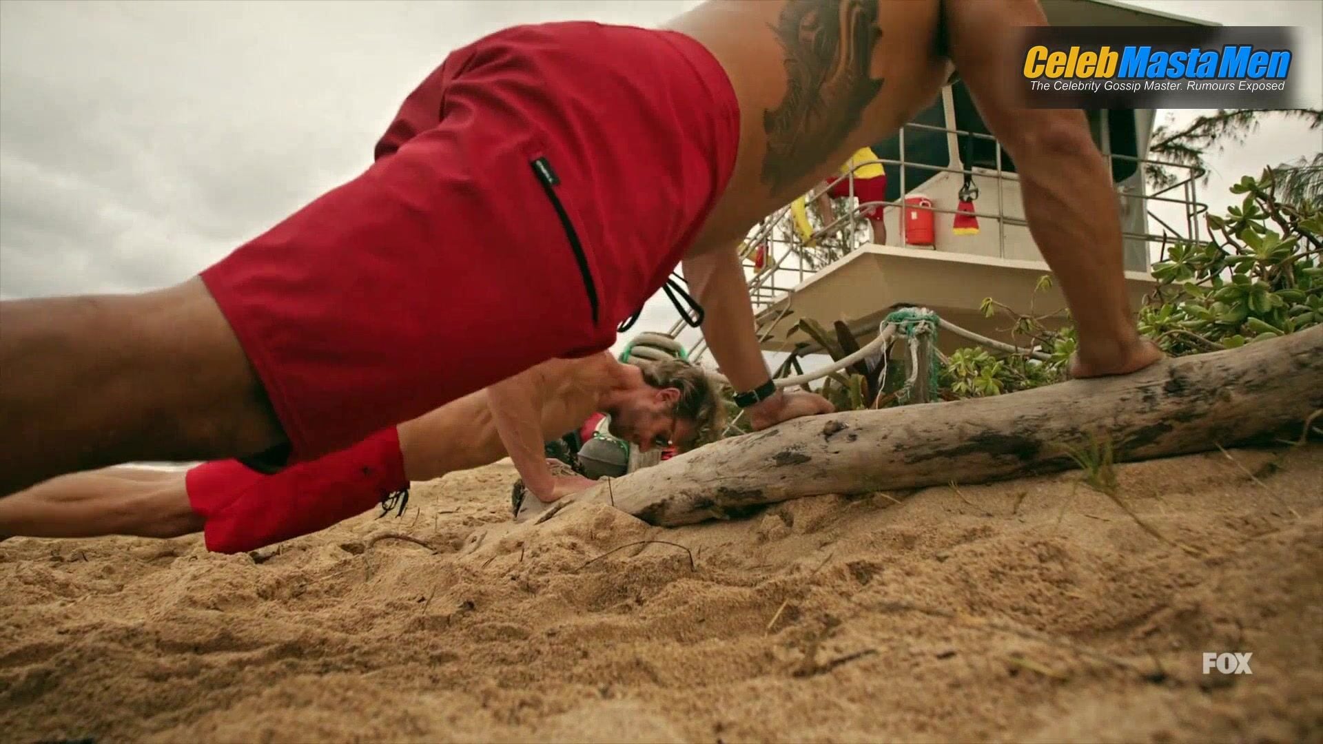 Adam Demos And Kekoa Kekumano’s Shirtless Scene - Photo 1 of 5